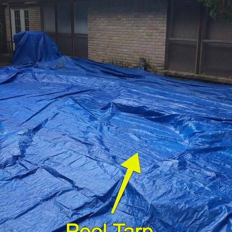 Roof tarp covering after shingle damage in Dallas, TX