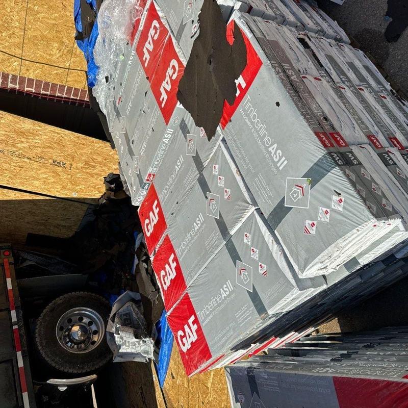 GAF Timberline ASII roofing shingles stacked for install