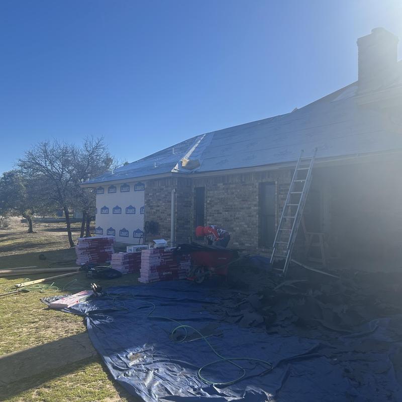 Roof decking removal and synthetic foam paper installation