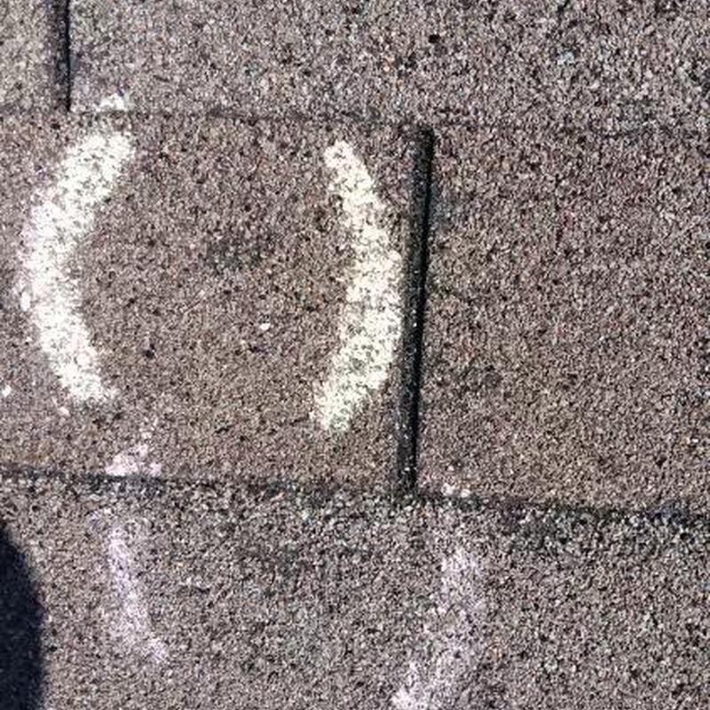 Asphalt shingles with inspection markings