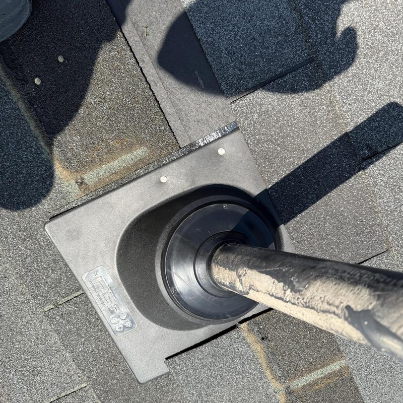 Roof pipe boot with sealed exposed fasteners