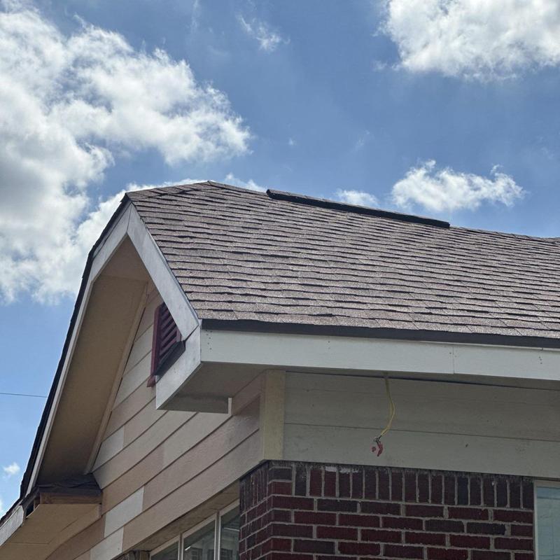Residential roof with visible sagging and shingle decking