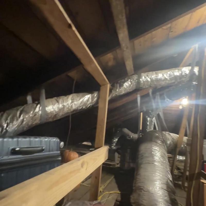 Attic ductwork and framing with ventilation inspection