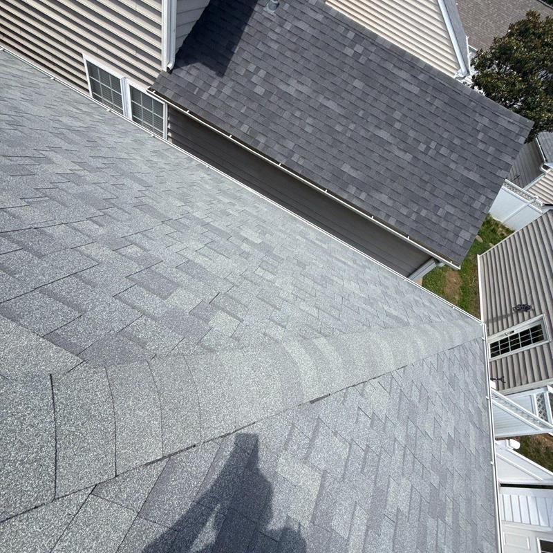 Asphalt shingle roof with granule loss and hail damage