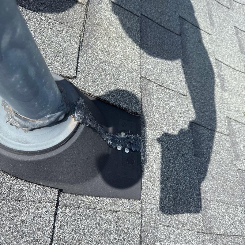 Roof pipe flashing with sealant and shingle granules