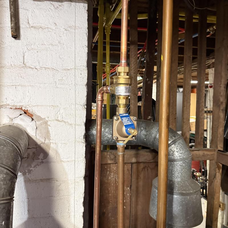 Boiler pressure relief valve and piping in basement