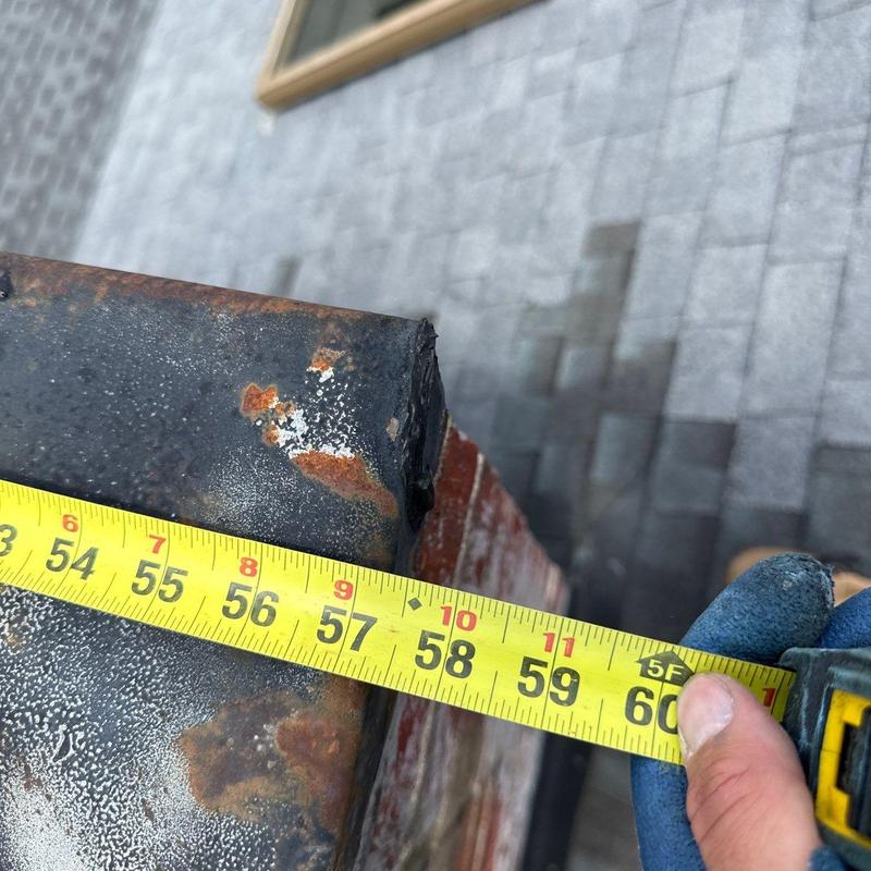 Metal flashing measurement with roofing shingles background
