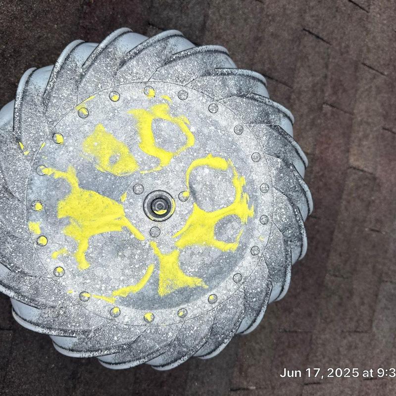 Turbine roof vent with hail and wind damage