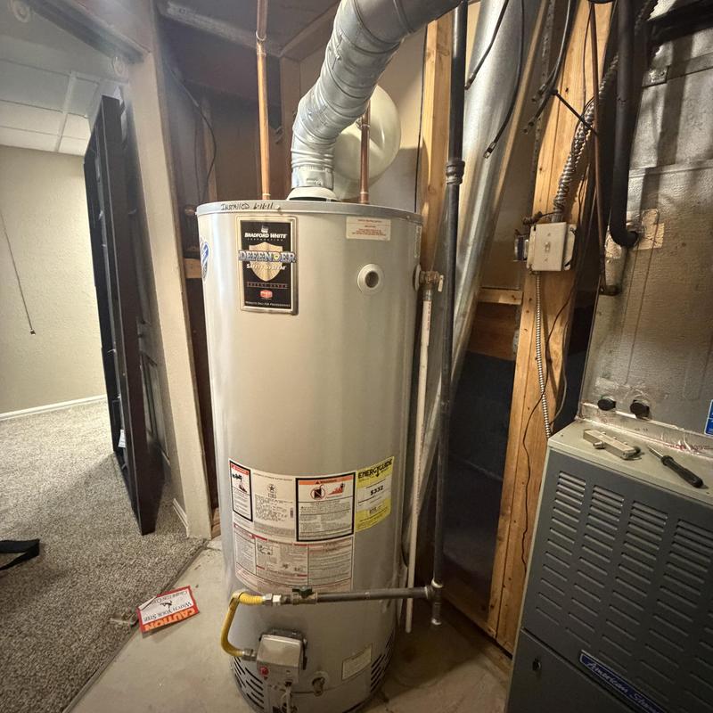 Water heater with vent pipe and gas line installation