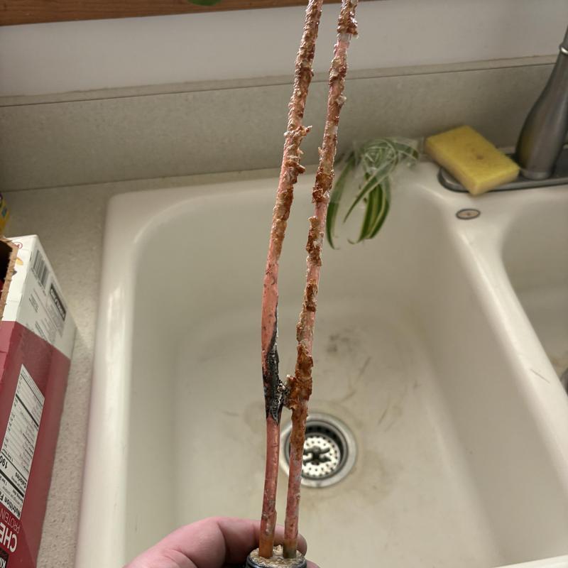 Water heater heating elements heavily corroded removed Water heater heating elements heavily corroded removed