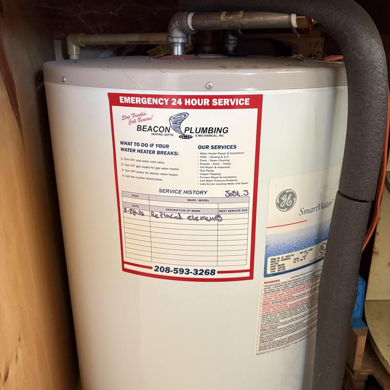 Water heater with replaced heating elements label Water heater with replaced heating elements label