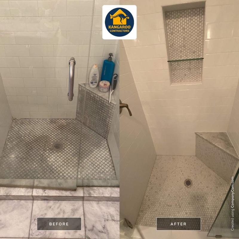 Shower tile floor and niche with frameless glass enclosure