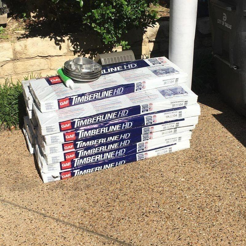 GAF Timberline HD roofing shingles stacked outdoors