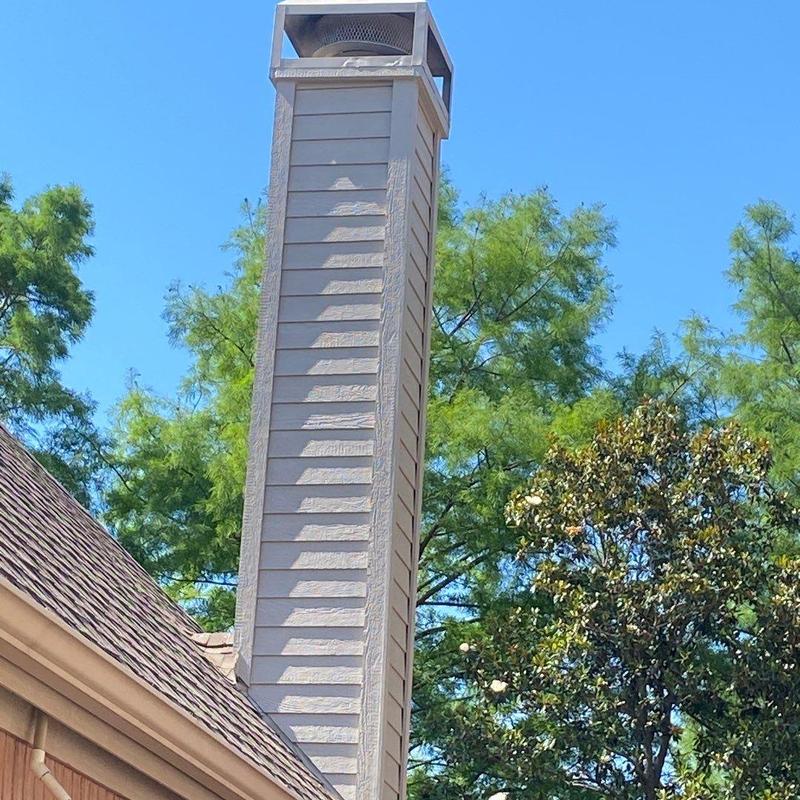 Chimney chase with LP SmartSide siding and trim