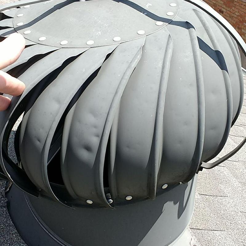 Roof turbine vent with visible dents and damage Roof turbine vent with visible dents and damage