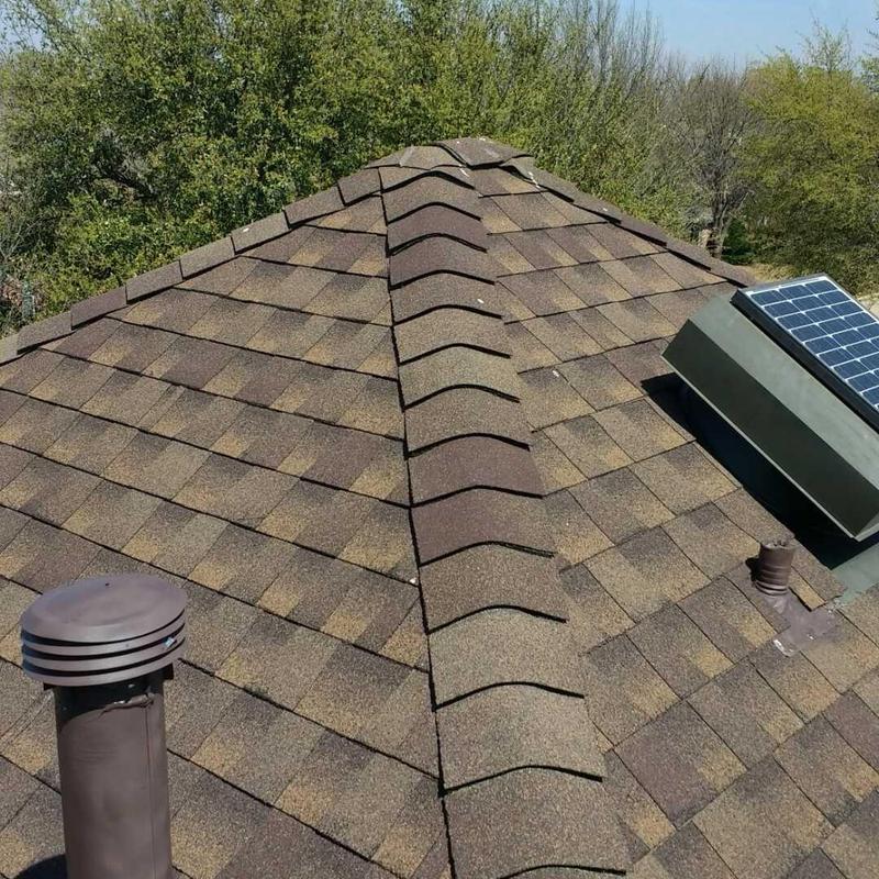 Barkwood GAF shingle roof with solar panel and vents