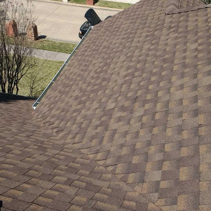 GAF Barkwood asphalt shingle roof and gutters replaced