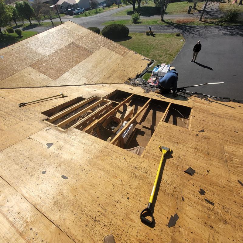OSB roof decking replacement and tear-off in progress