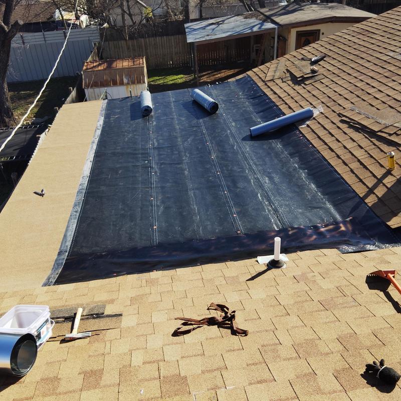 Flat roof with new waterproof membrane installation