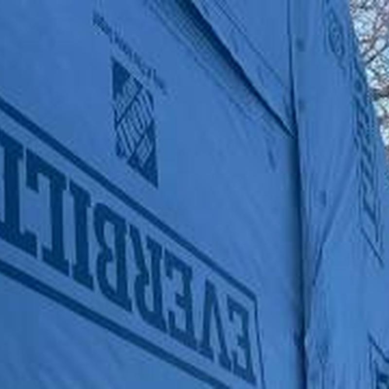 Synthetic roofing underlayment on home addition decking