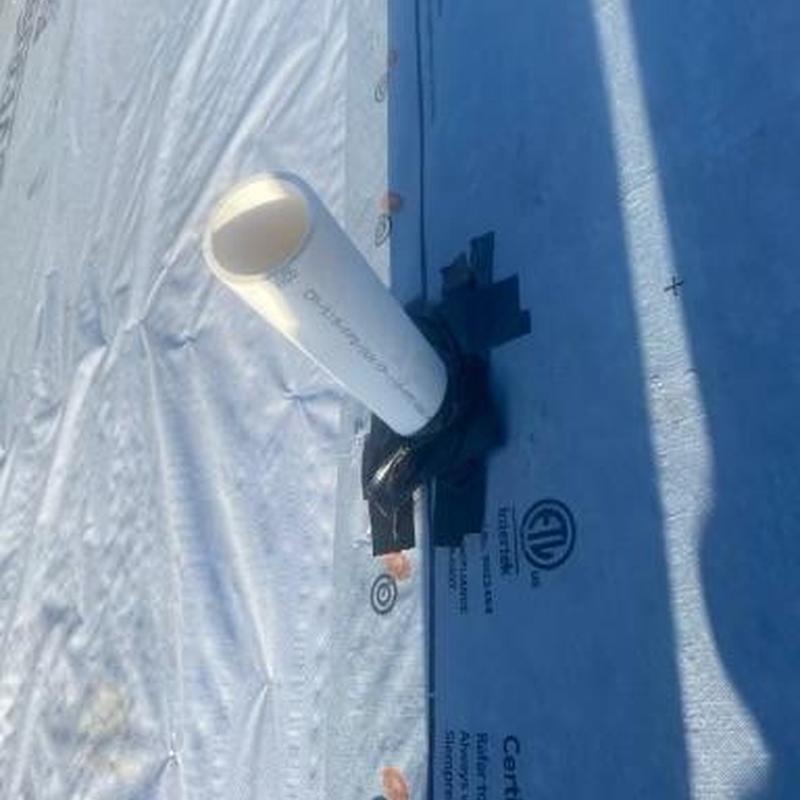 Synthetic roofing underlayment with vent pipe flashing installation