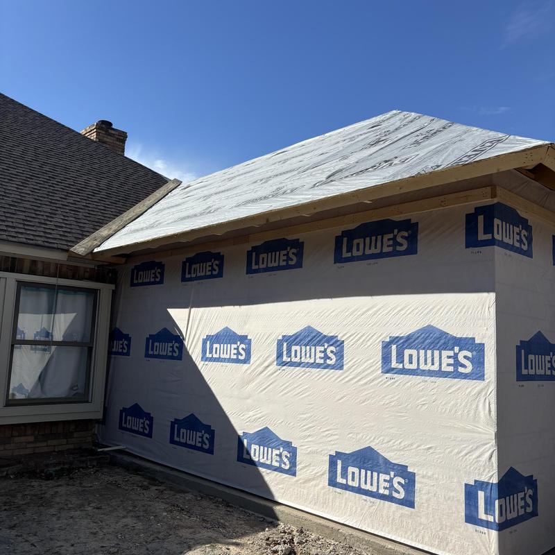 Synthetic roof underlayment on home addition deck