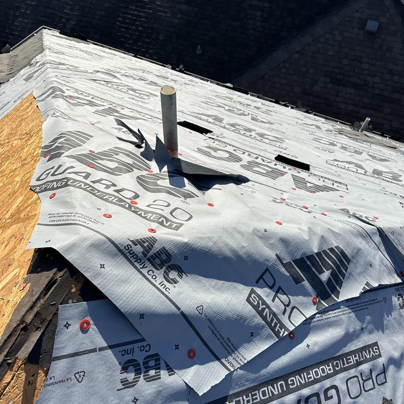 Synthetic roofing underlayment installation over plywood decking