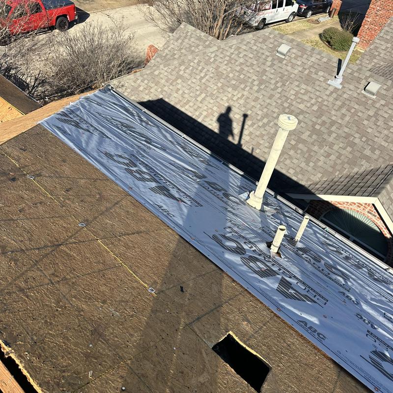 Roof decking with synthetic foam paper underlayment installation