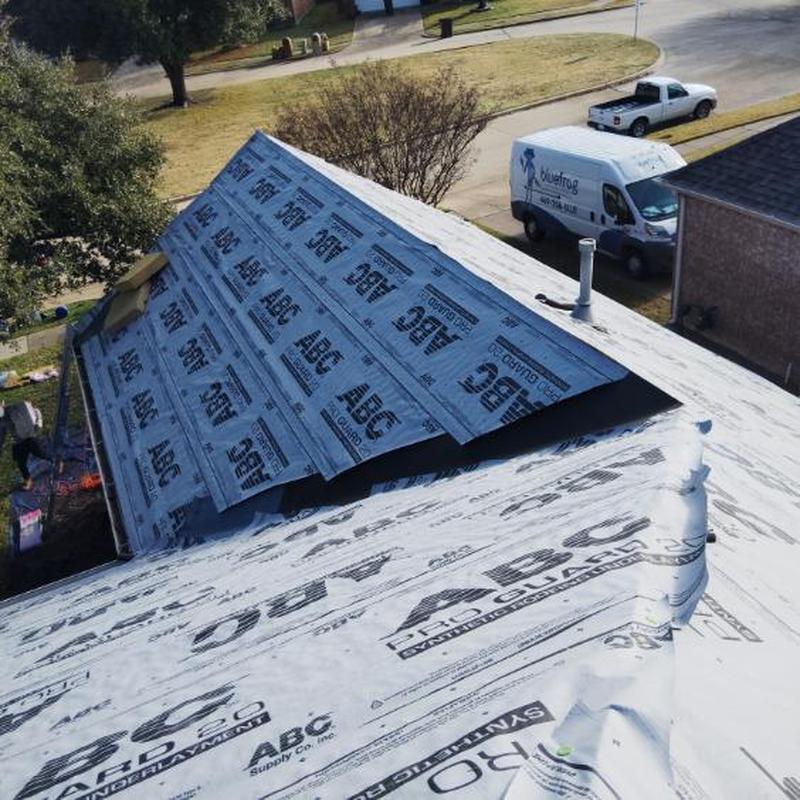 Synthetic roofing underlayment installation on roof decking