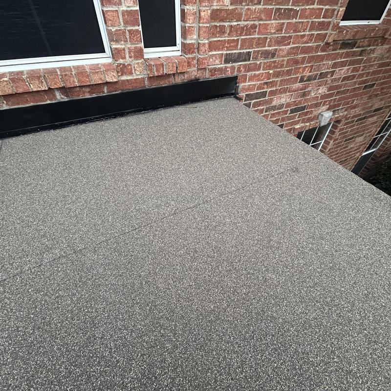 Flat roof over porch with driftwood coating