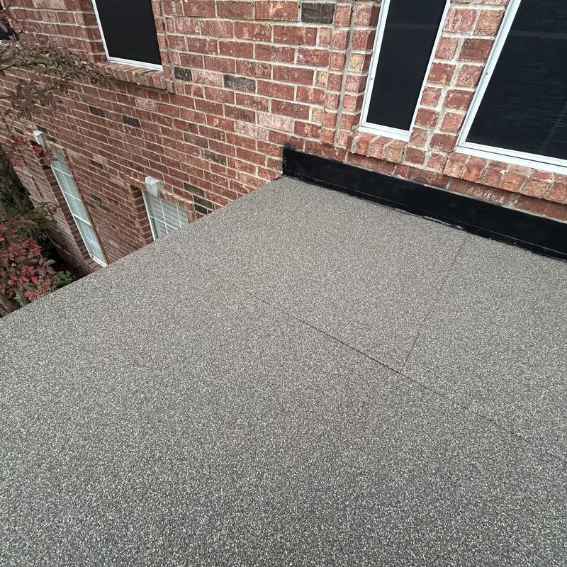 Driftwood flat roof installation on front porch