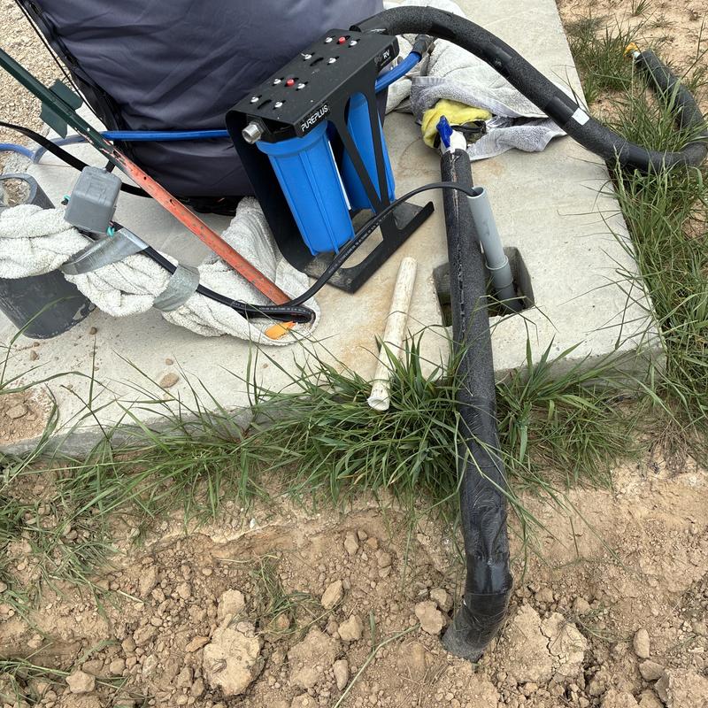 Water filtration system installation with pipe insulation