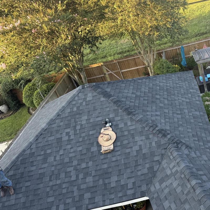 Architectural shingle roof with ridge vent and flashing