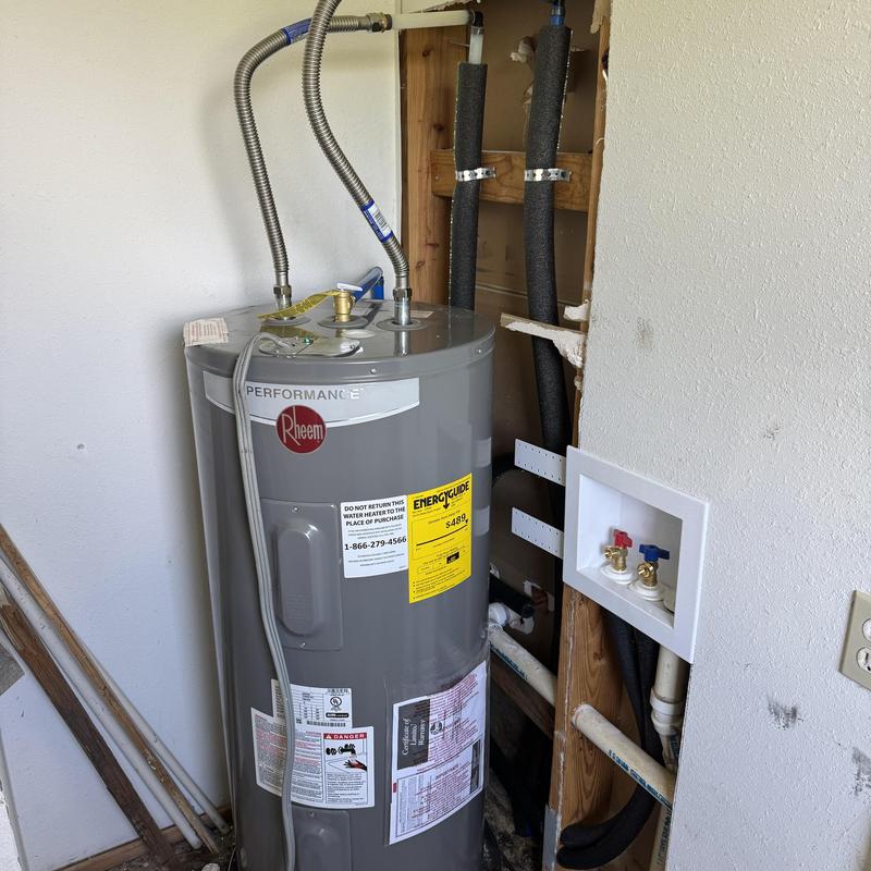40-gallon electric water heater with new plumbing connections