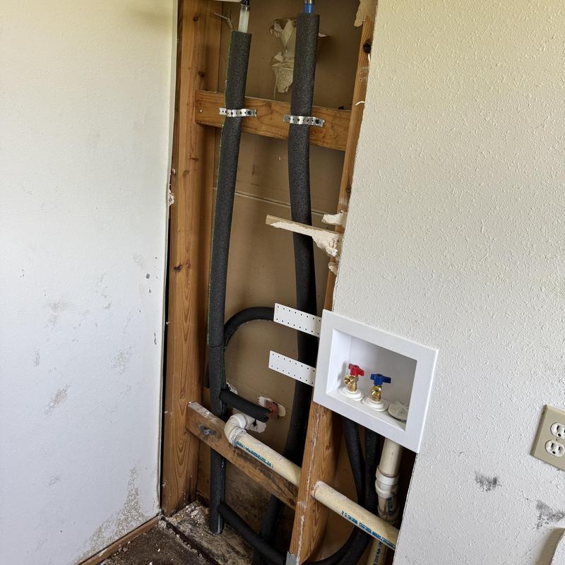 Laundry box with hot and cold valves installed in wall cavity
