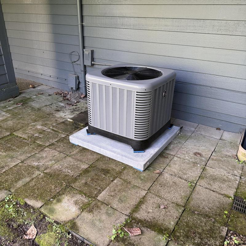 RUUD 13.4 SEER2 air conditioner unit on pad RUUD 13.4 SEER2 air conditioner unit on pad