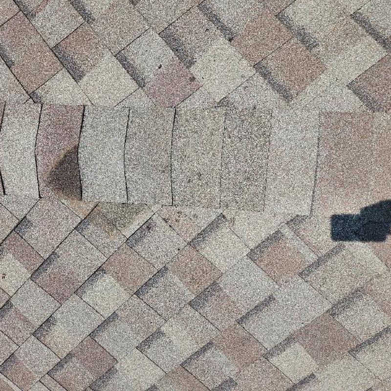 30-year shingle replacement on damaged roof section