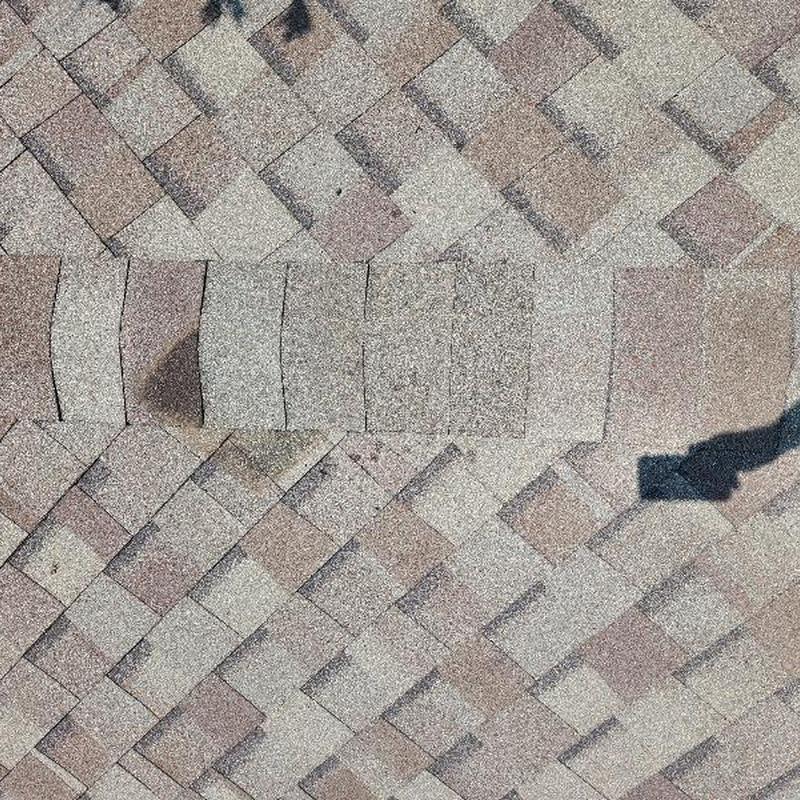 30-year shingles replacement on damaged roof section