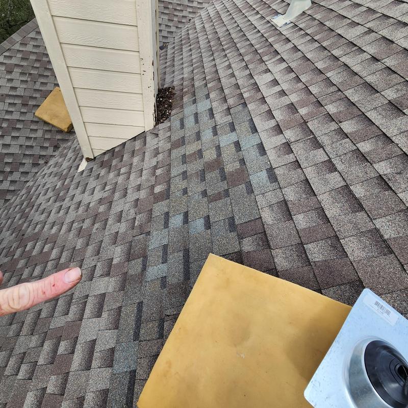 Shingle roof with replaced 30-year field shingles and plumbing boot Shingle roof with replaced 30-year field shingles and plumbing boot