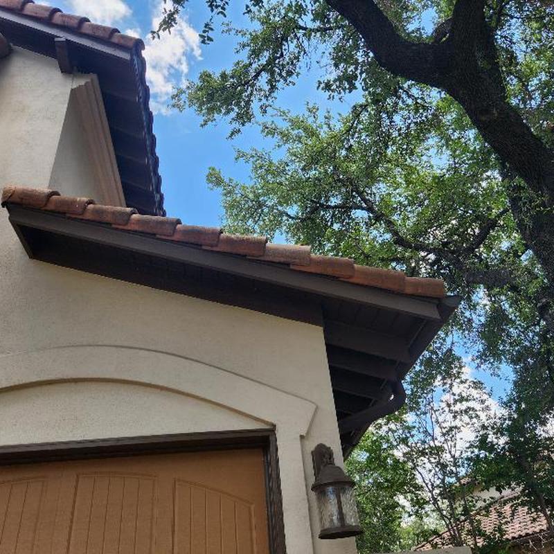 Clay tile roof with sealed lead flashing and cleaned debris Clay tile roof with sealed lead flashing and cleaned debris