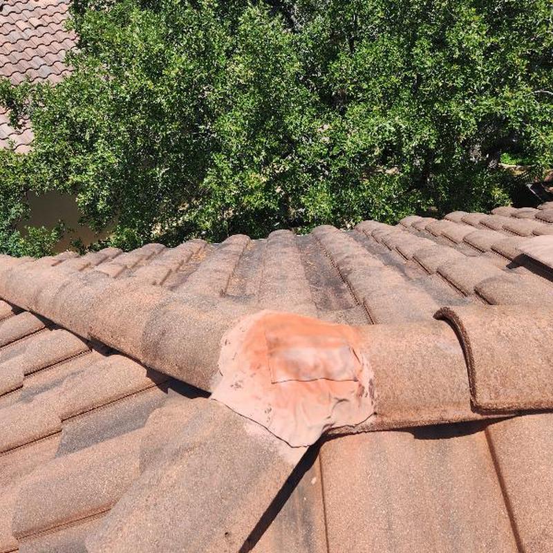 Clay tile roof with Wakaflex sealing lead flashing hole Clay tile roof with Wakaflex sealing lead flashing hole