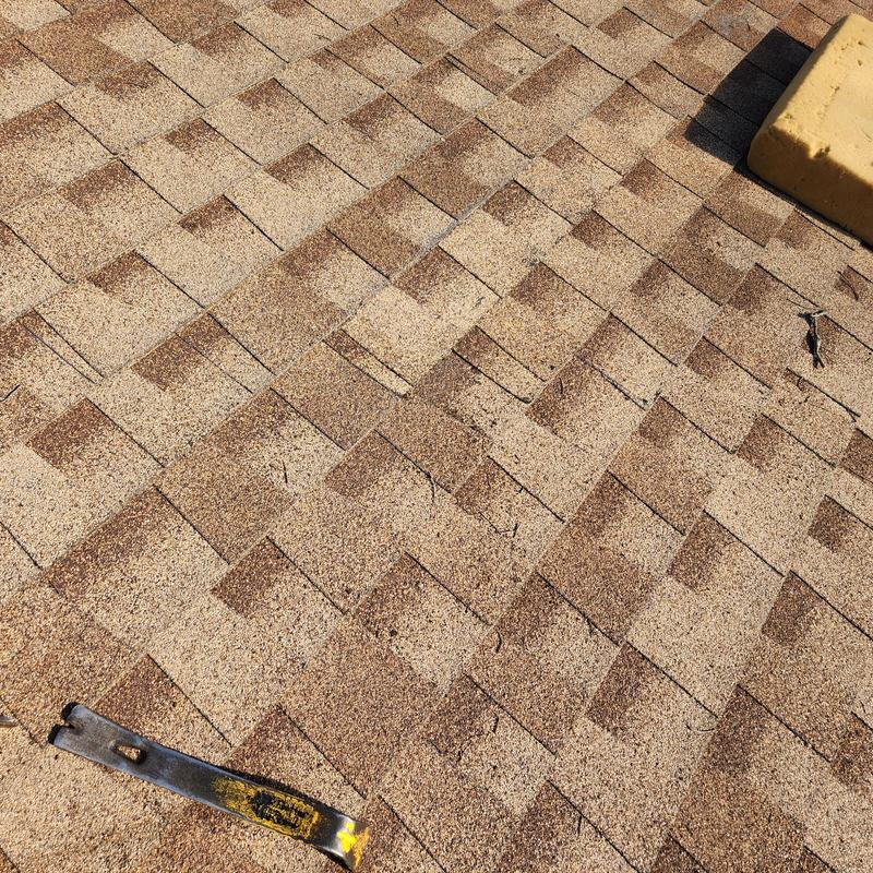 GAF Shakewood asphalt shingles with roof pry bar GAF Shakewood asphalt shingles with roof pry bar