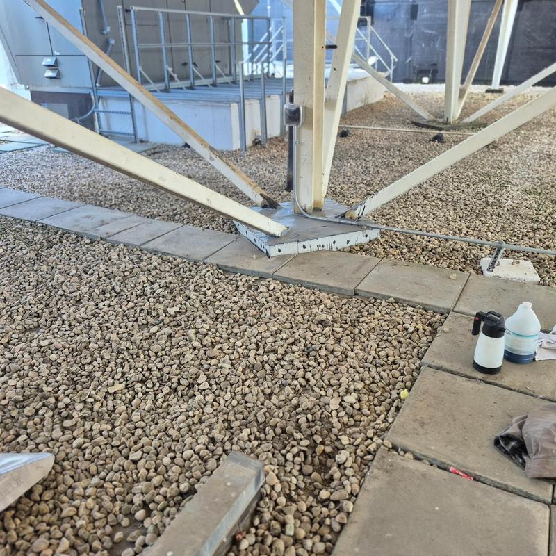 Ballasted EPDM roof with metal support base and ballast Ballasted EPDM roof with metal support base and ballast