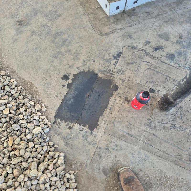 EPDM roof membrane patch near vent pipe and ballast EPDM roof membrane patch near vent pipe and ballast