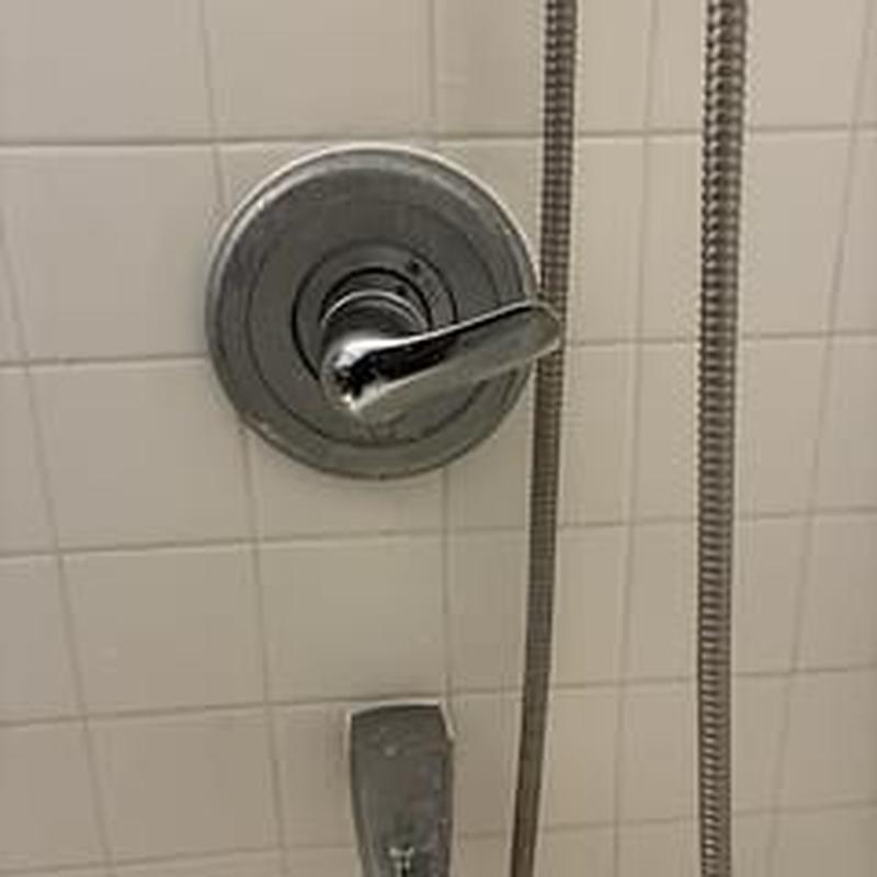 Pressure balanced bath tub faucet handle and wall tiles