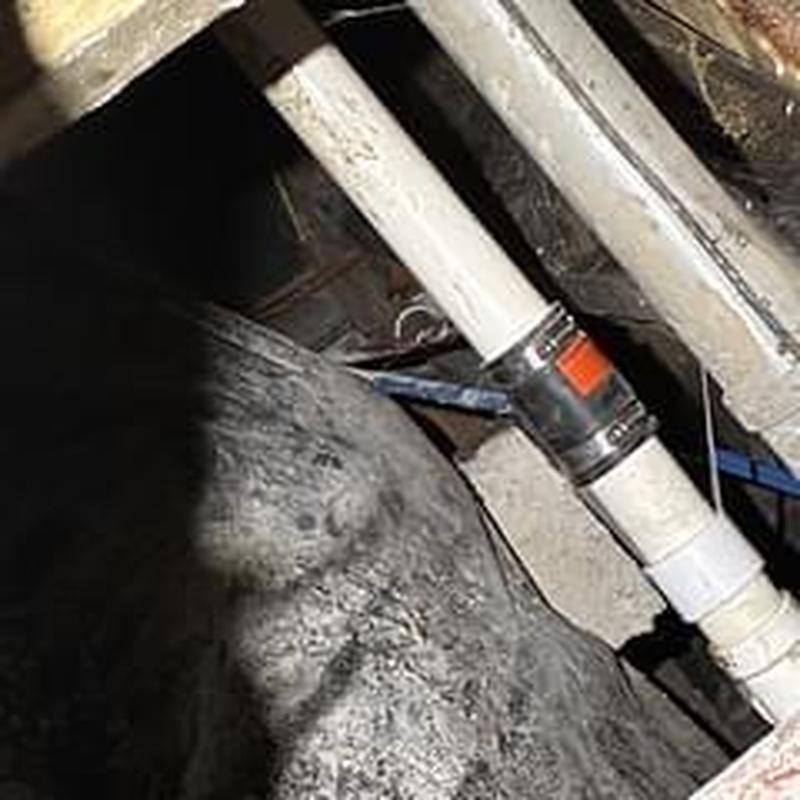 Kitchen drain line with rubber repair coupling