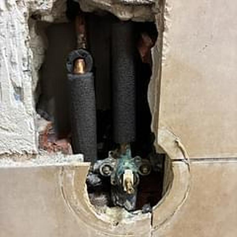 Shower cartridge valve with wall access hole exposed