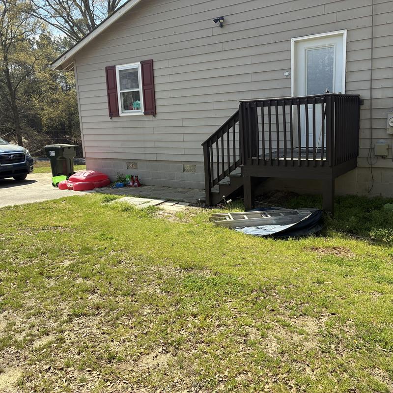 Pressure treated wood landing and stairs replacement outdoors