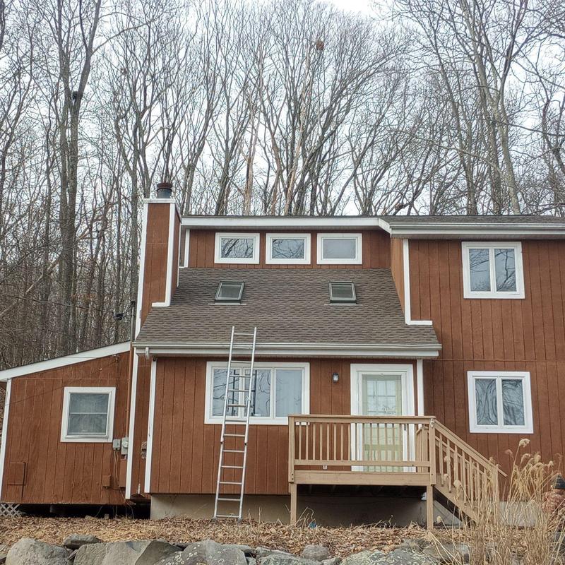 Asphalt shingle roof with ladder for replacement