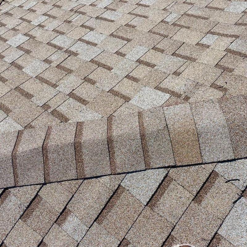 Shingle roof with visible curling and wear in Cape Coral